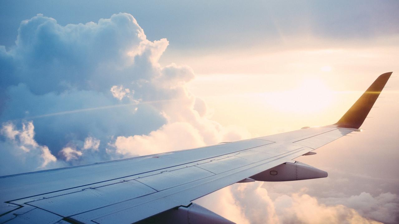 View of an airplane wing mid-flight