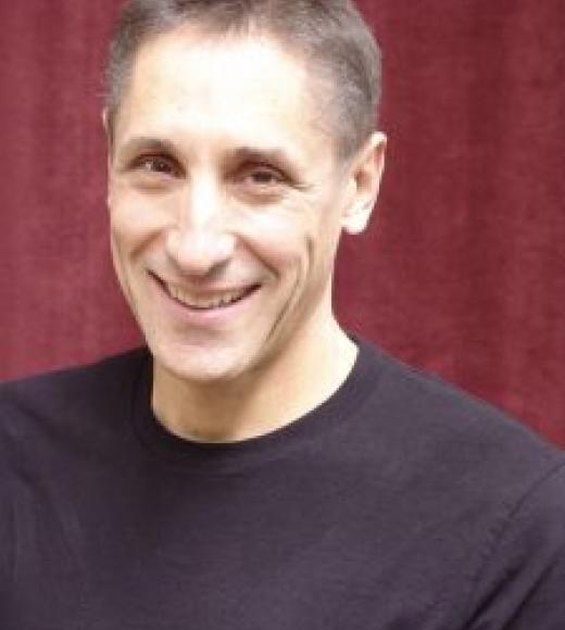 Headshot of Mark Delucchi
